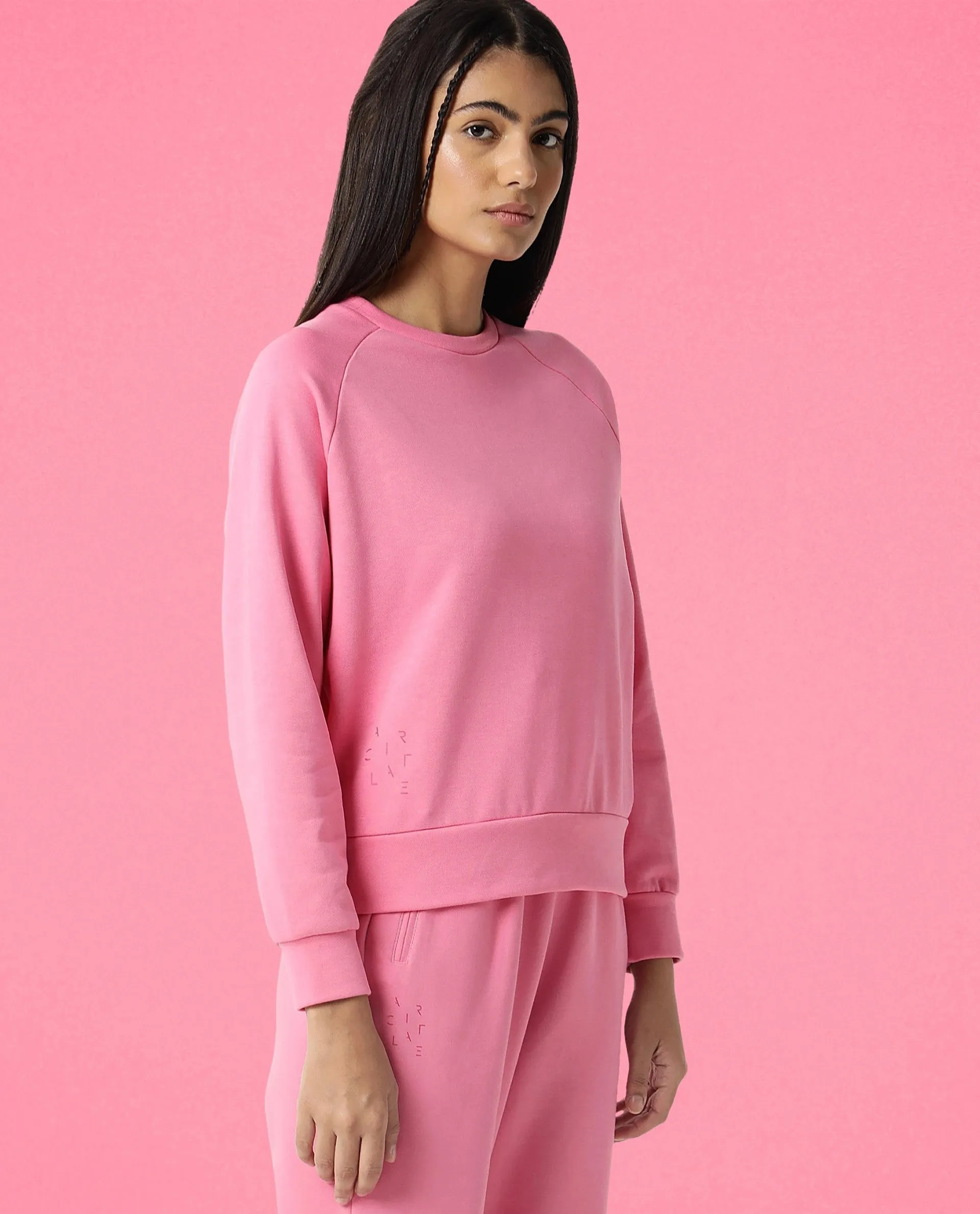 Rareism Women Cax Flouroscent Pink Cotton Blend Fabric Relaxed Fit Full Sleeves Solid Round Neck Sweatshirt